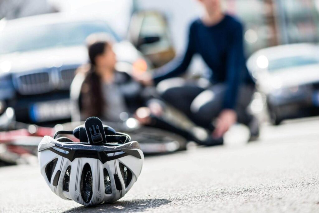 Someone was hit by a car while riding their bike.
