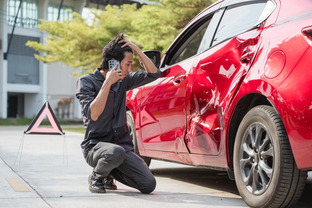 A damaged car, leaving the driver to wonder whether you can sue someone for damaging your car.
