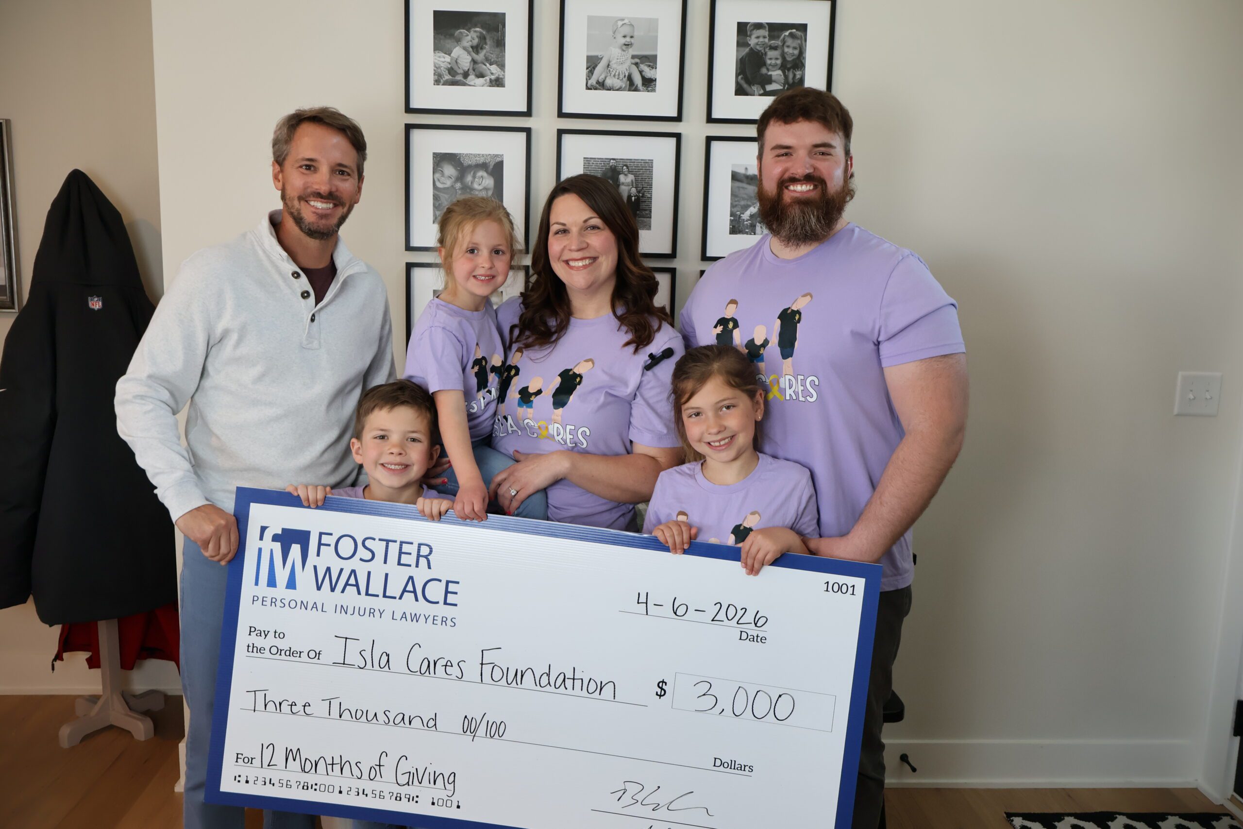 Foster Wallace Presents $3,000 Check to the Isla Cares Foundation