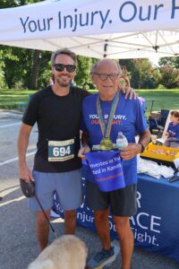 Brian Wallace with family member at the BIAKS brain injury walk in Kansas City.